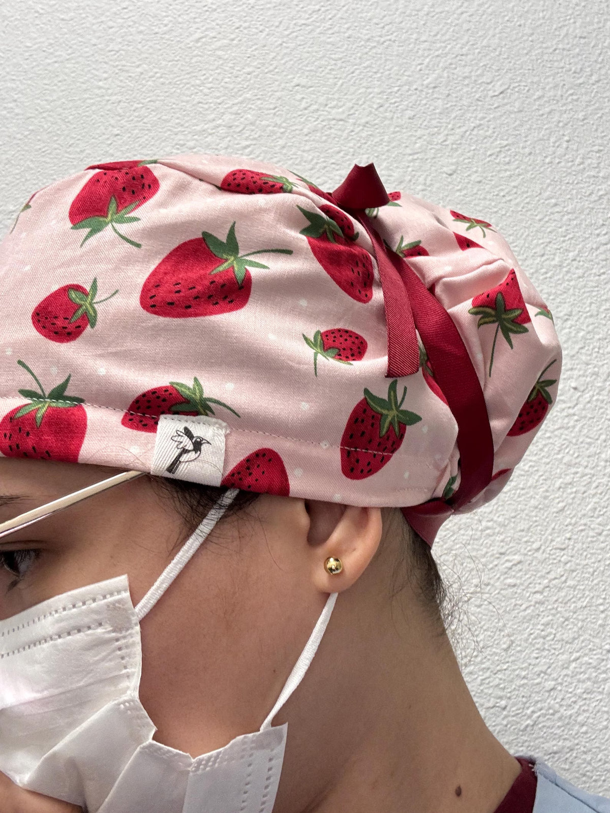 Gorro de tela para exfoliación con diseño de fresa