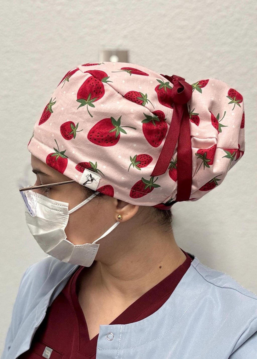Gorro de tela para exfoliación con diseño de fresa