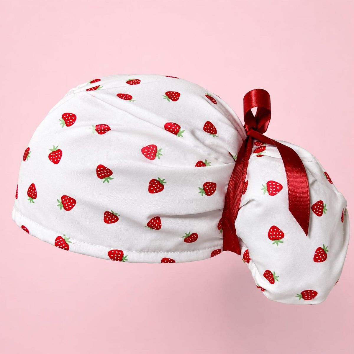 Gorro de tela para exfoliación con diseño de fresa